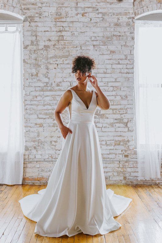 Bride wears satin Kennedy Blue bridal gown