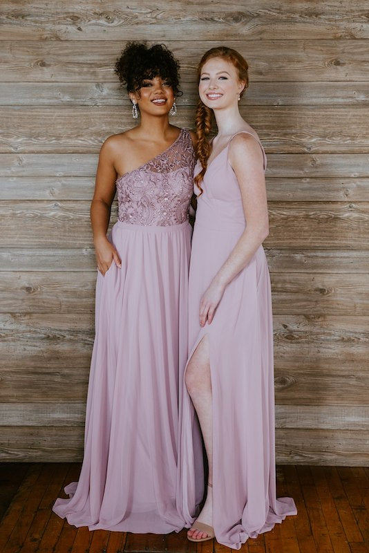 Pair of bridesmaids wearing Kennedy Blue dresses in desert rose