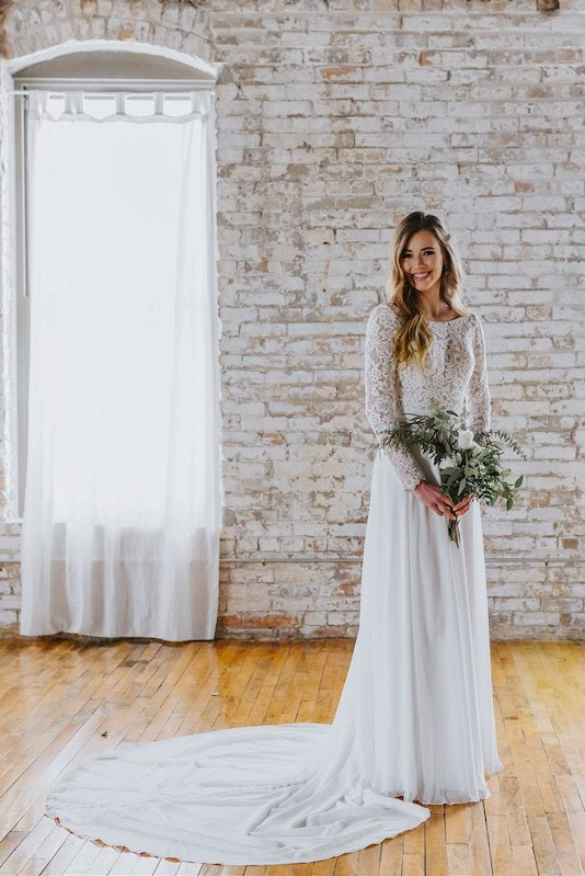 Bride wears Kennedy Blue lace and chiffon long sleeve wedding dress